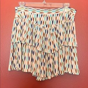Printed mini skirt, gently used.
